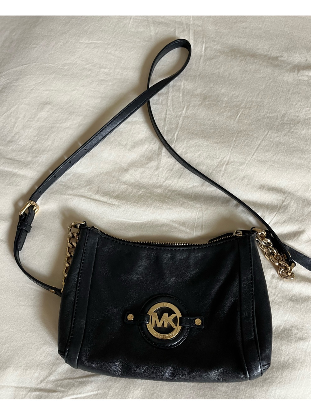 Michael Kors Black Leather crossbody Bag with Gold accents on strap